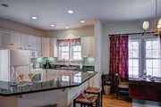 A view of the kitchen and dining table in the Guest Cottage